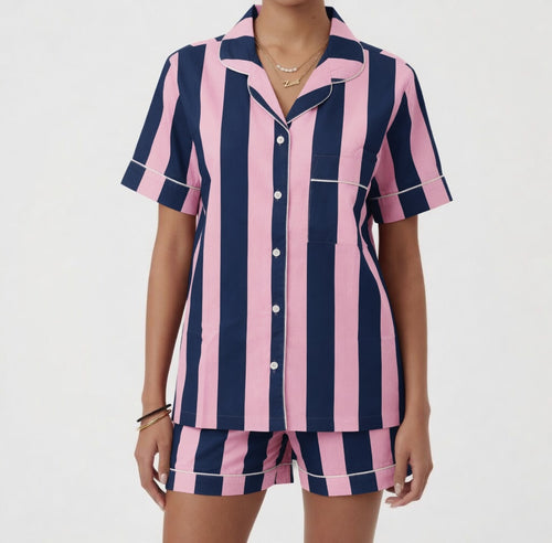 Detail of blue and pink stripe cotton PJ set by Ilk Collective