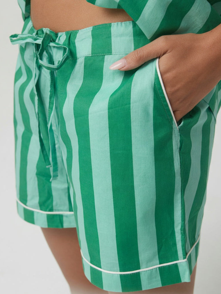 Close-up of green stripe classic short PJ set by Ilk Collective